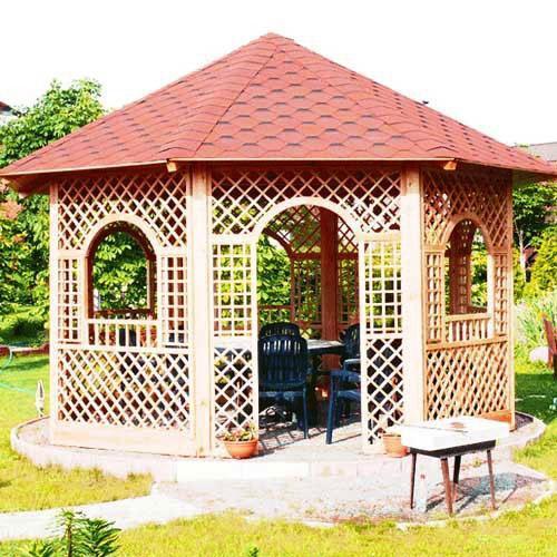 Cozy gazebo in the center of the garden with a fence