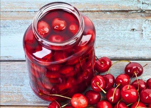 sterilized cherries in juice with sugar