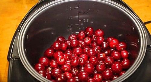 put the cherries in a slow cooker and add sugar